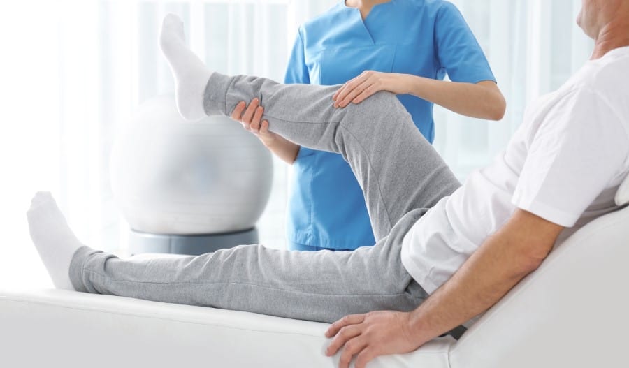 stock-photo-doctor-working-with-patient-in-hospital-closeup-rehabilitation-physiotherapy-1345945193